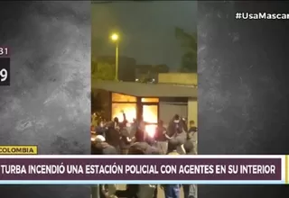Bogotá vivió una noche violenta en la que una turba incendió una estación policial con agentes dentro